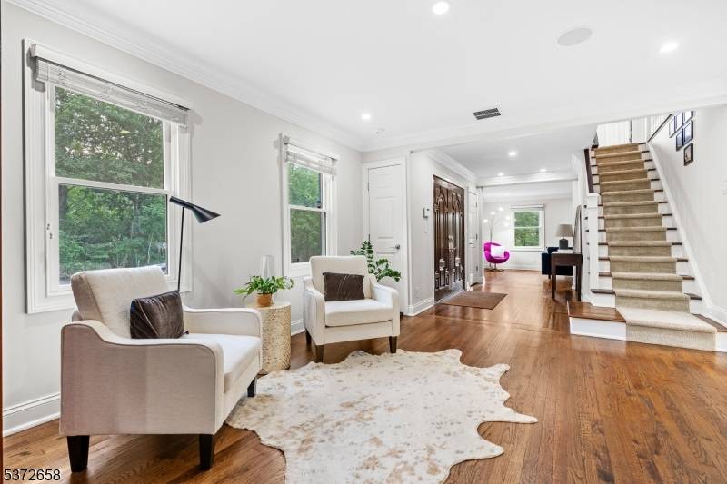 Beautifully maintained brick front Colonial in a highly sought after Short Hills neighborhood, just blocks from top rated Deerfield Elementary.