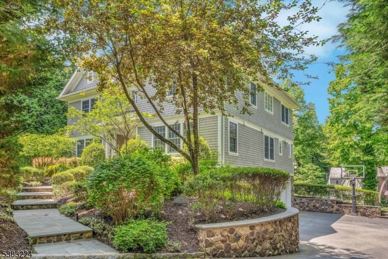 Experience luxury and functionality in this stunning, newer construction home in Summit's top rated Lincoln Hubbard school district.