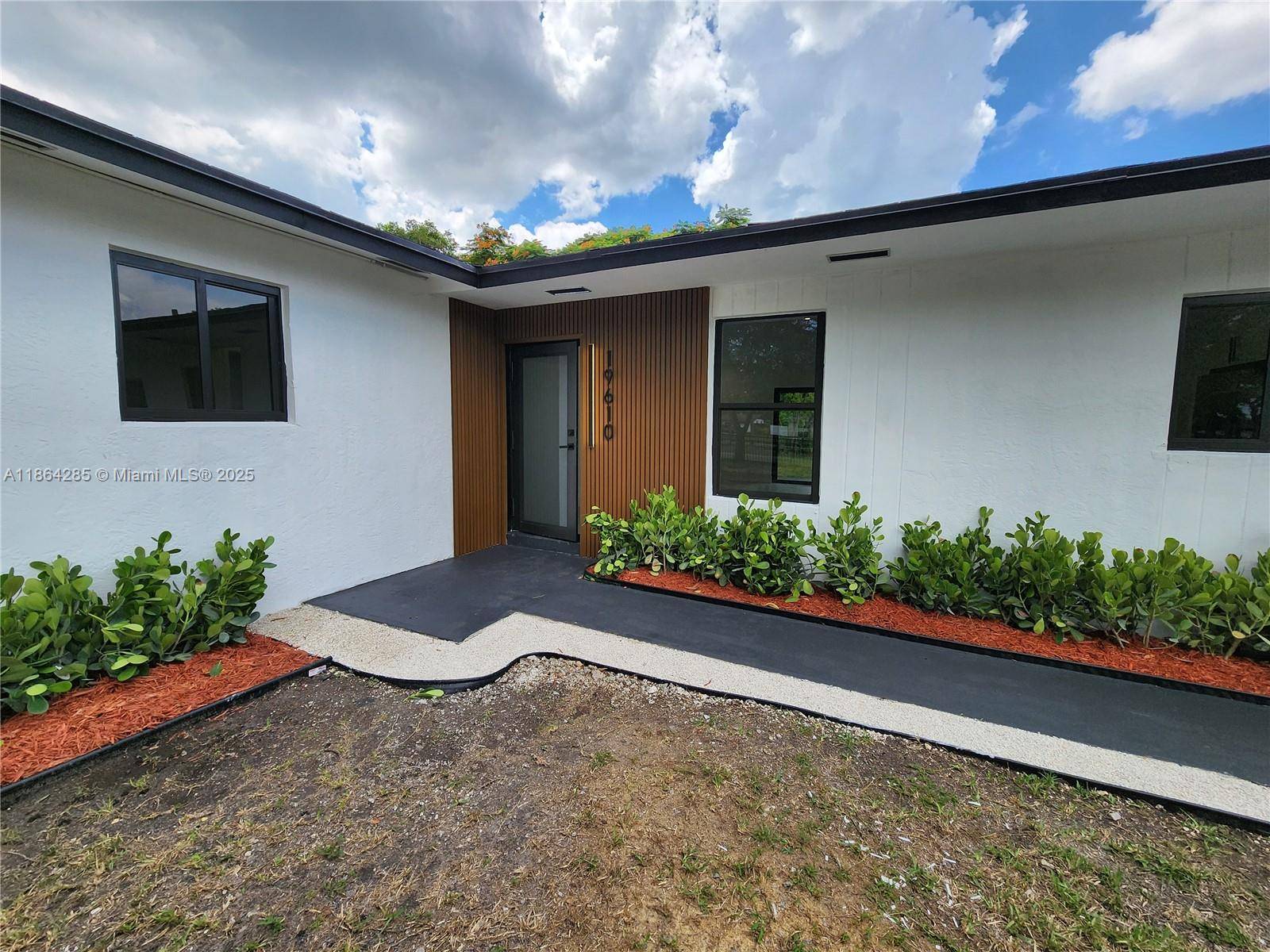 Beautifully remodeled 5 bedroom, 3 bathroom Single Family Home fantastically located across the street front Roberta Hunter Trial Park.