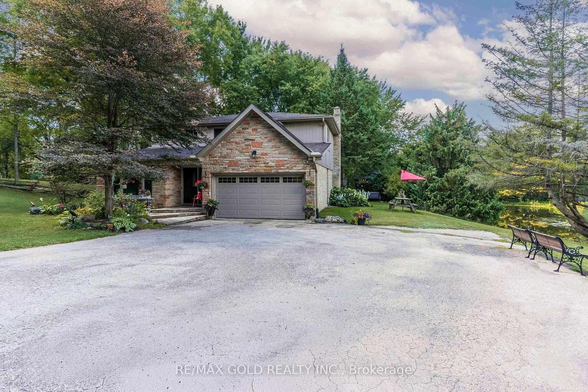 Experience the tranquility of cottage country right at home with this beautifully updated residence on 2.