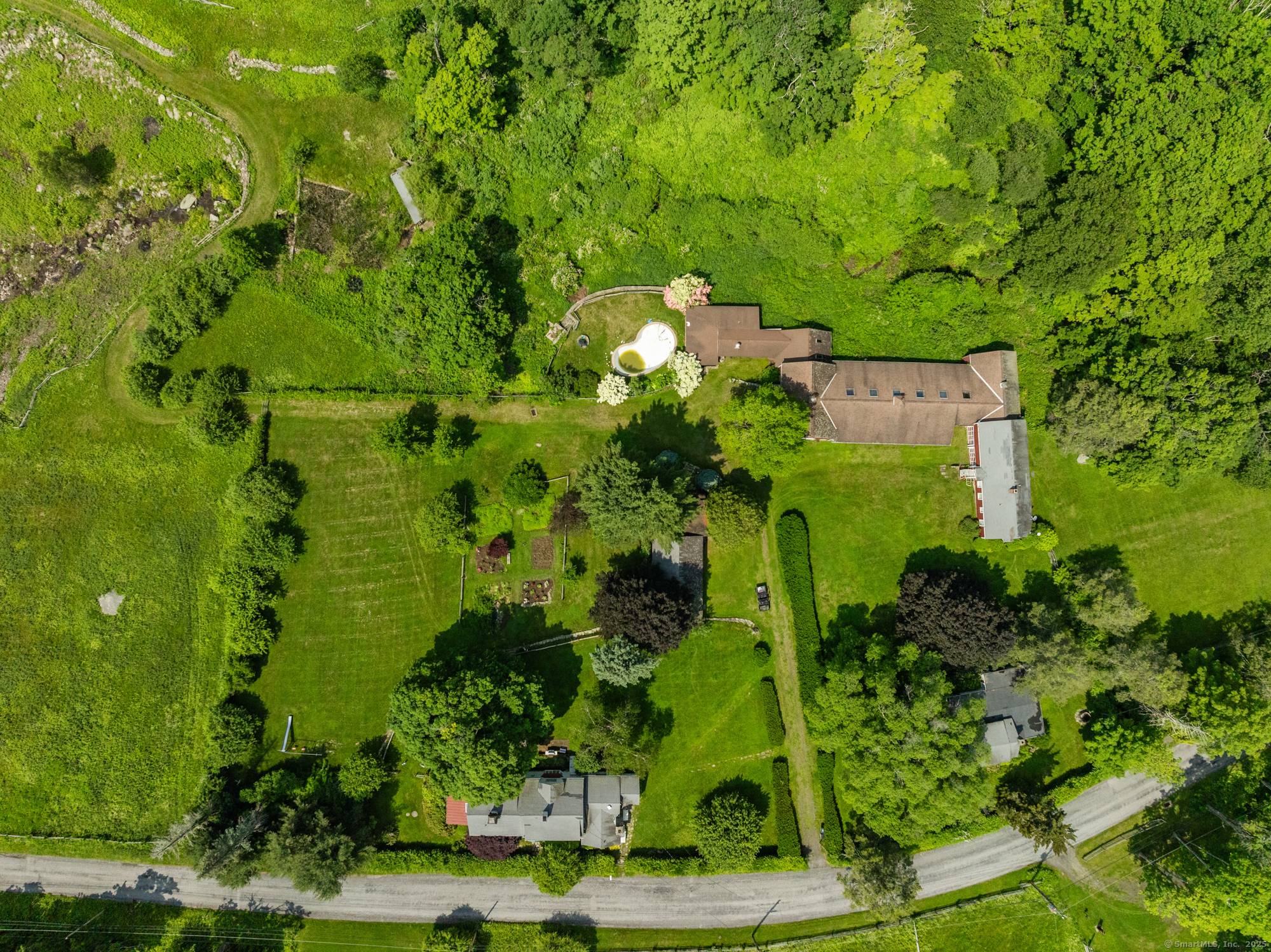A once in a lifetime opportunity to own a significant estate overlooking Lake Waramaug.