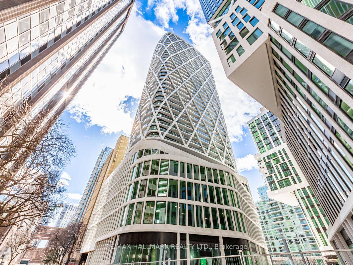 Move into this brand new, never lived in 2 Bed, 2 Bath condo at 230 Simcoe St, Toronto, glowing with south facing natural light.