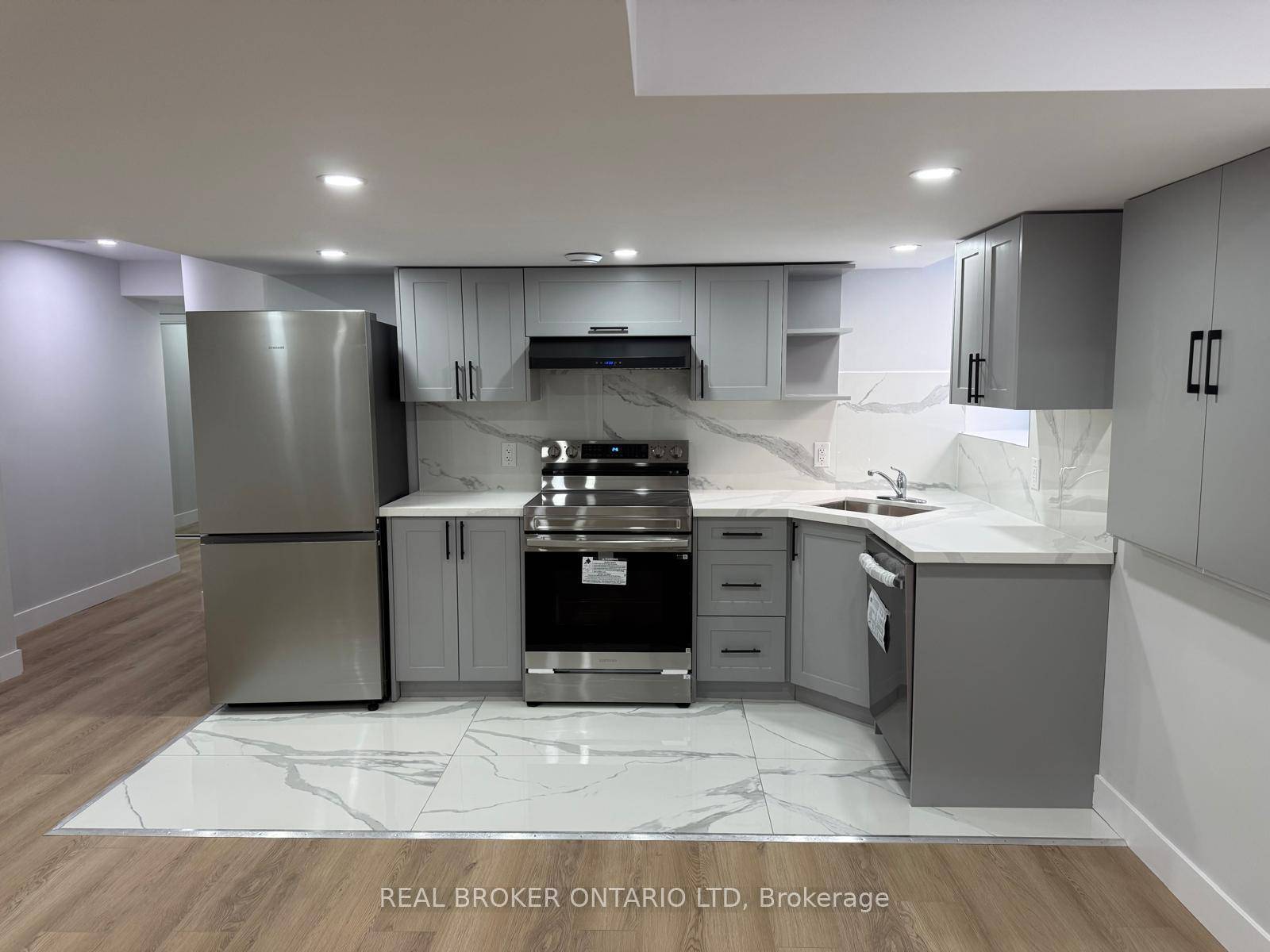 Bright and modern 2 bedroom basement unit with one full bathroom, spacious open concept living area, and side entrance for added privacy.