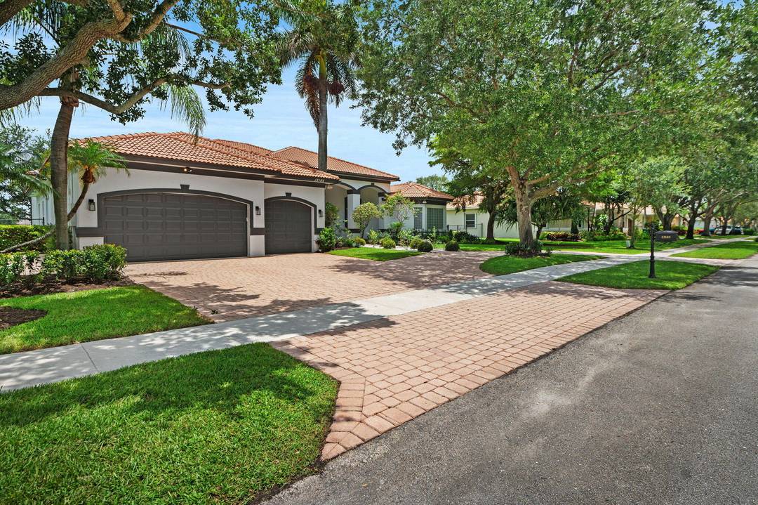 Fully renovated and professionally designed lakefront 6BR 4BA home in a private gated community in Davie, offering modern luxury and resort style living.