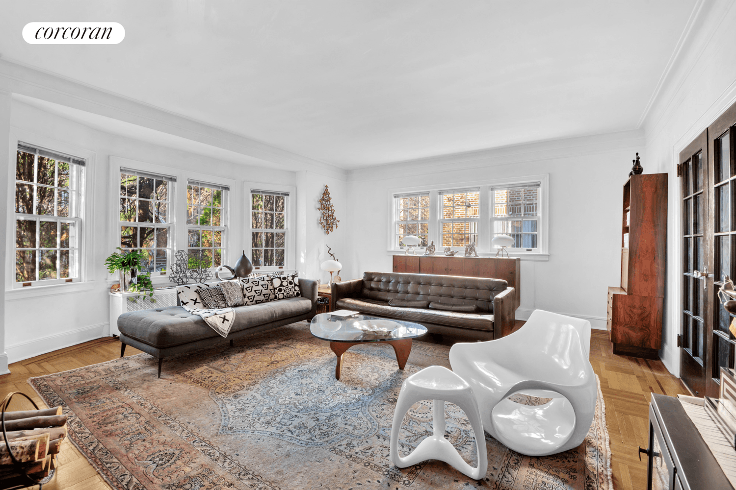 Discover the timeless elegance of 34 41 83rd Street, a rare opportunity to own one of the most spacious and elegantly restored homes in the Jackson Heights Historic District.