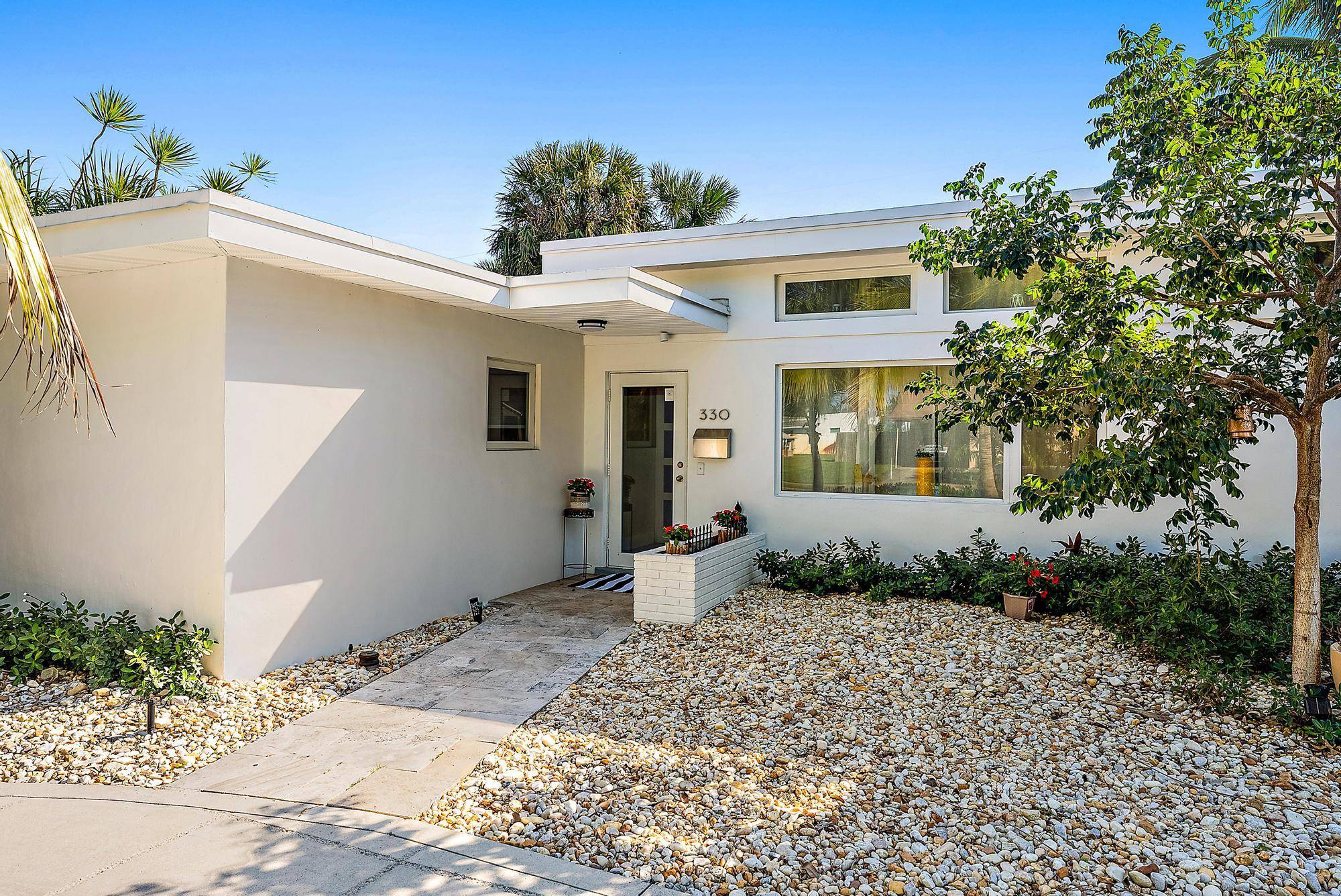 For rent in SoSo 3BR 2. 5BA mid century modern home w a pool, just blocks from the Intracoastal Waterway Flagler Drive bike path.