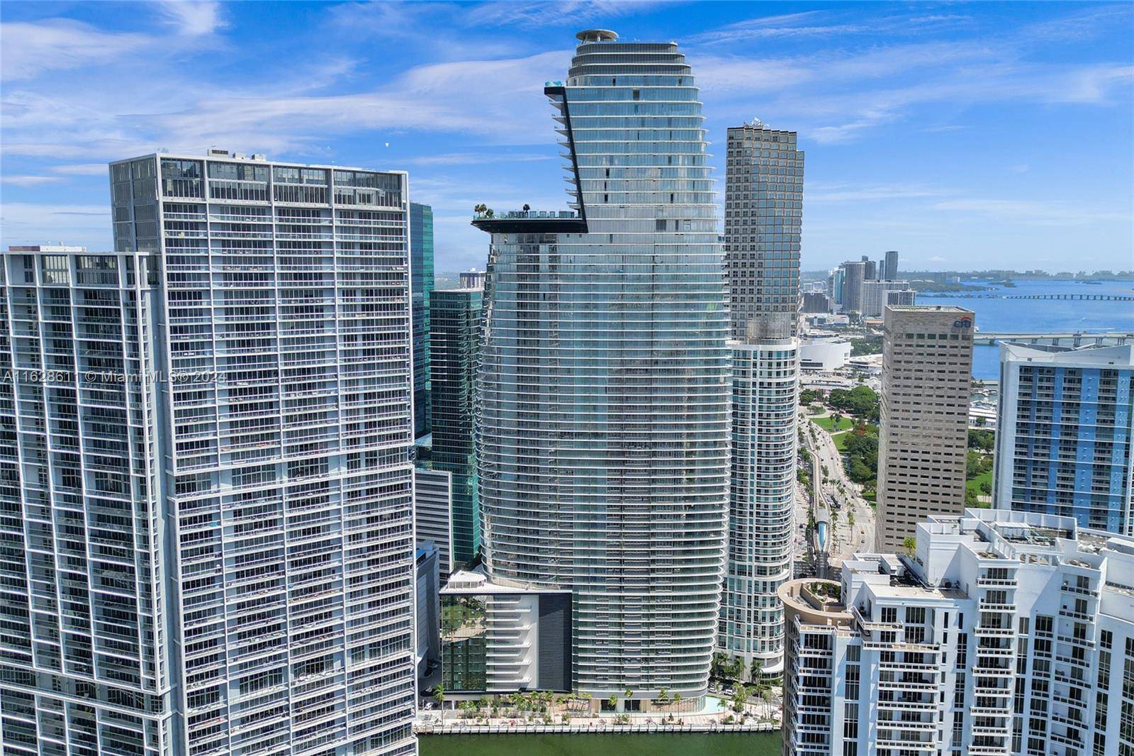 Welcome to Aston Martin Residences Unit 1607 This stunning 2 bed, 3 bath den corner residence offers 10 ft ceilings, a private elevator, and foyer.