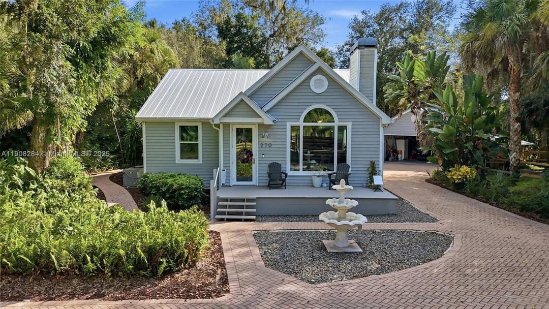 Discover charm and modern comfort in this 2 story LaBelle home on over half an acre with direct Caloosahatchee River access and a private boat dock perfect for boating, fishing, ...