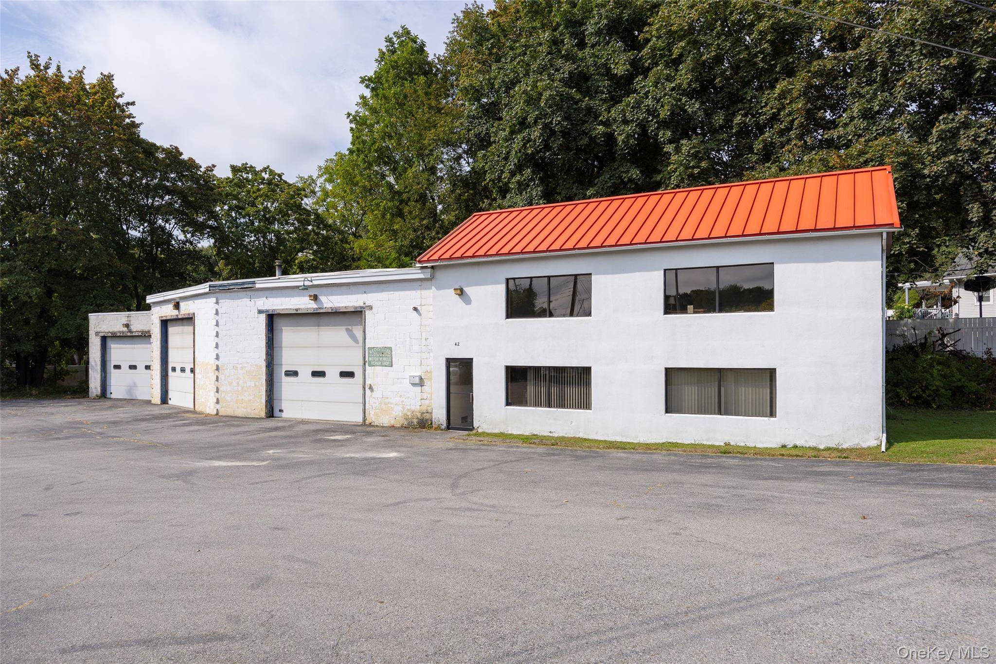 Centrally located warehouse with three large bays, workshop amp ; two story office space.