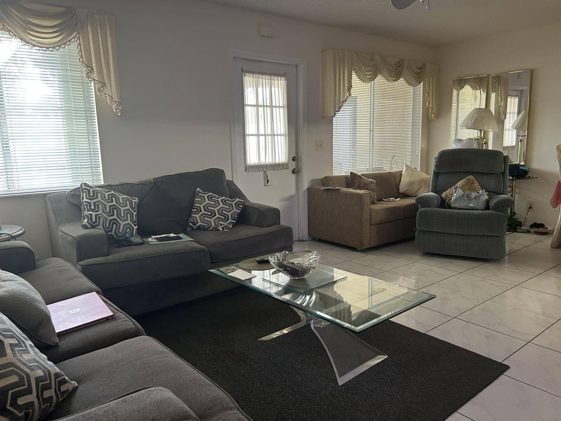 This is a 55 beautiful condo on the second floor with enchanting porch for your quiet view, ready and furnished for you to move right in.