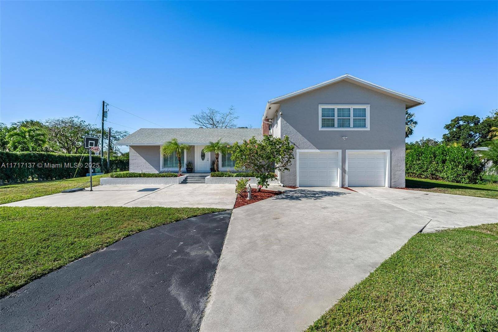 If you have been looking for a pristine Davie acre home with a storybook view.