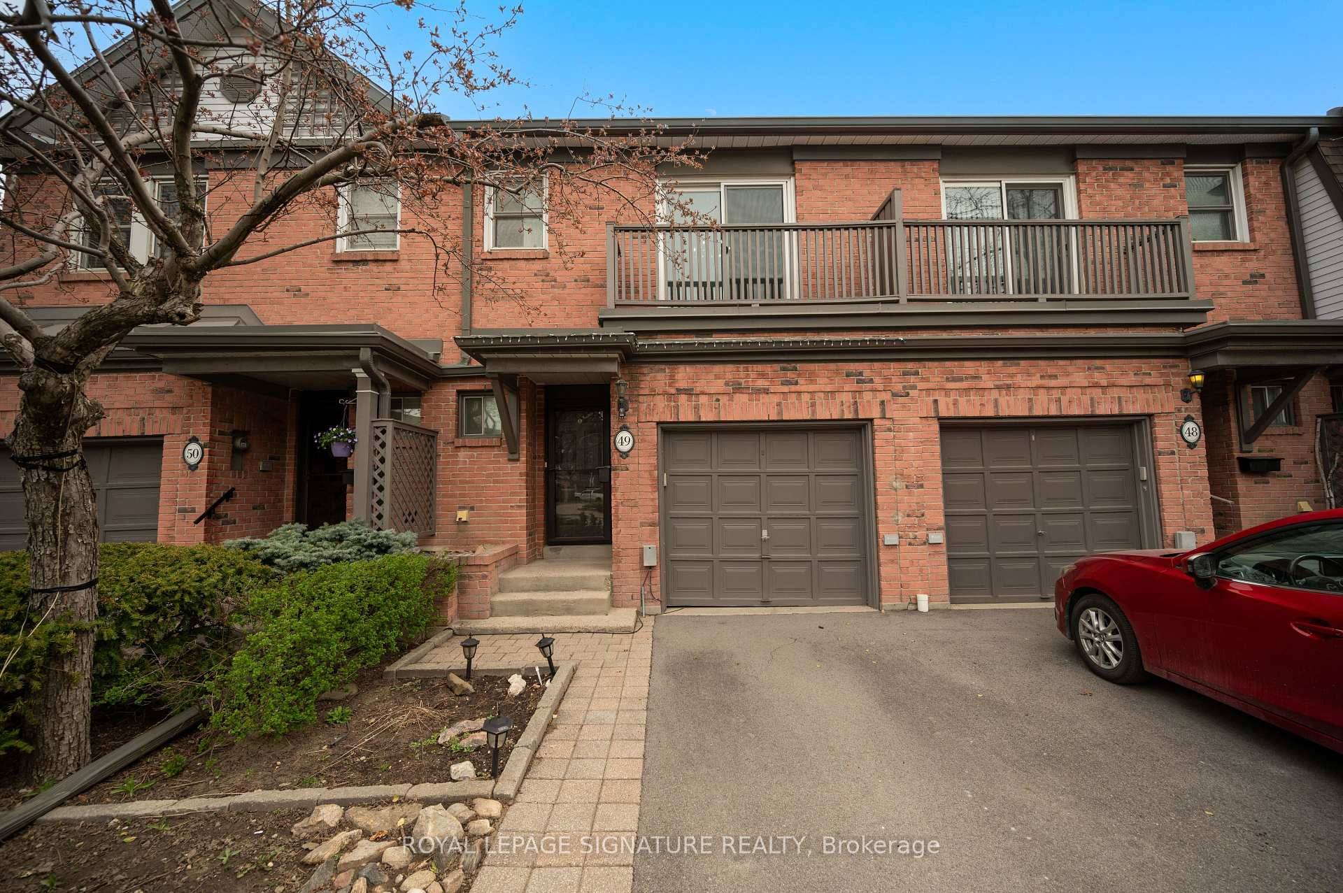 Welcome to a rare and stunning executive townhome that truly checks all the boxes.