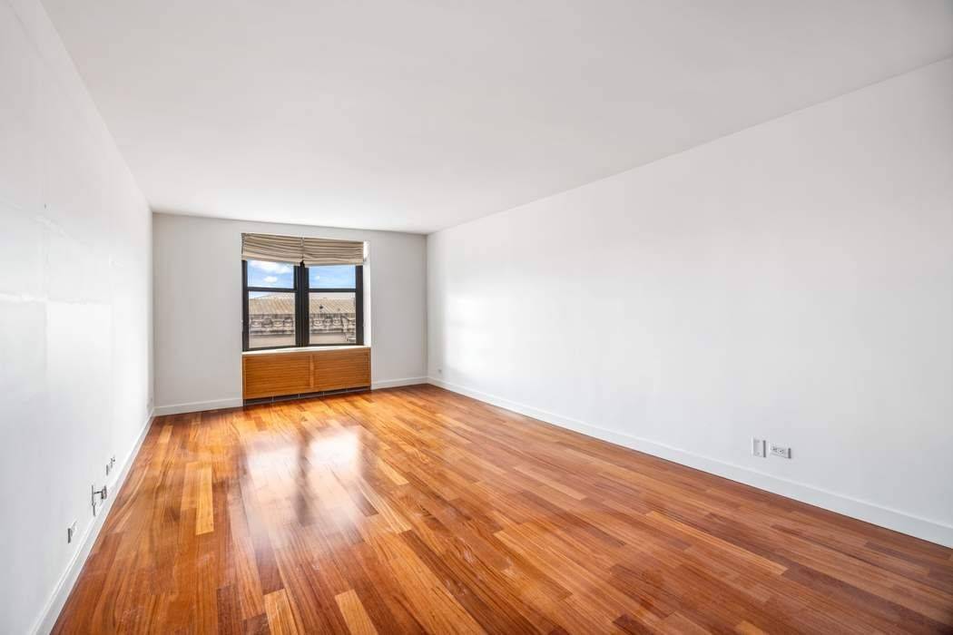 An Iconic view of the Metropolitan Museum, and Central Park welcomes you as soon as you enter the apartment 11D, on the 11th floor, at the full service Coop 1001 ...