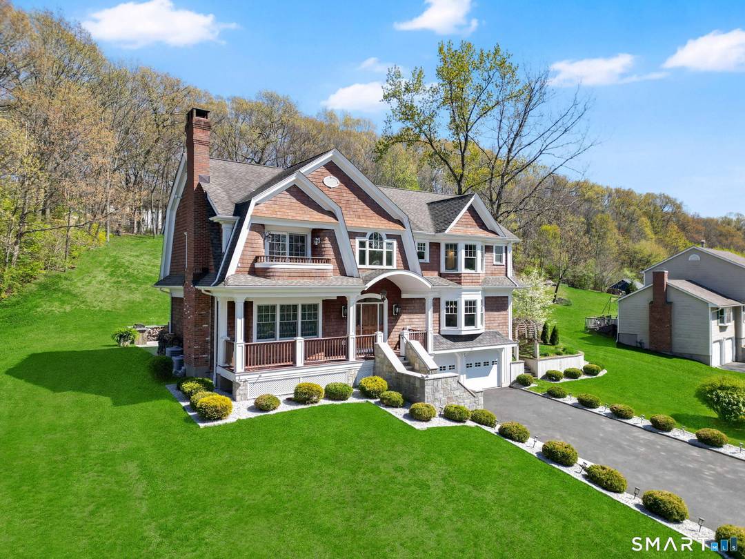 Set within Monroe's premier Whitney Farms golf course community, this exceptional 4 bedroom Colonial offers a rare blend of craftsmanship, scale, and refined design.