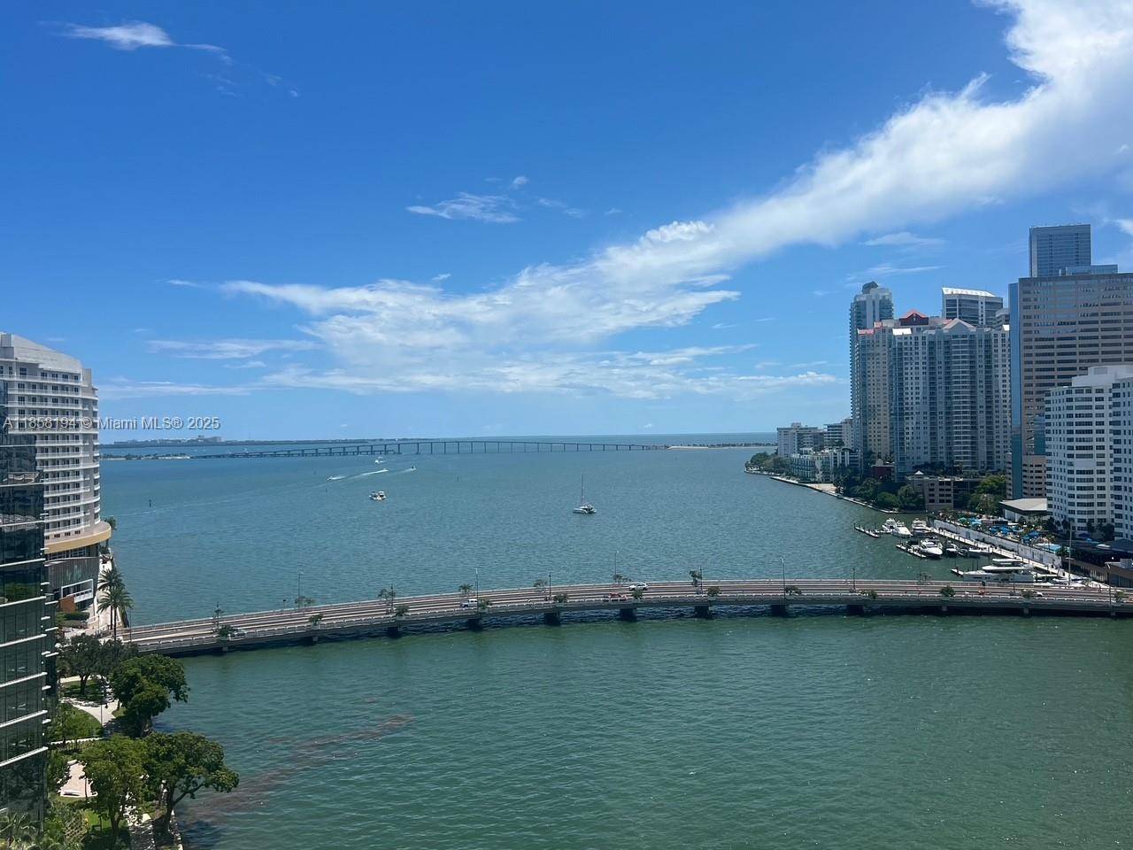Two balconies, Corner unit, unobstructed water views, Kitchen is updated and opens to living room,, parking spaces, 1 storage unit under A C, Doorman, valet available, all on Brickell key, ...