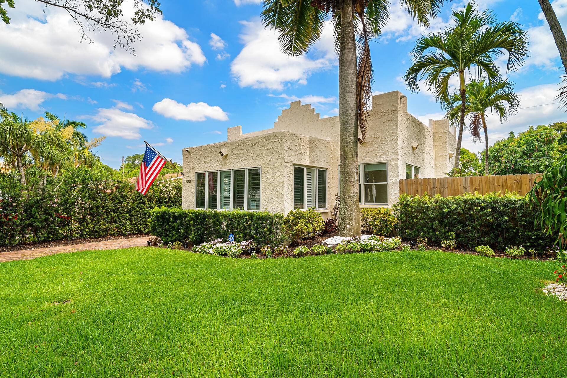 Classic 1920s Spanish Mission on an oversized lot in the heart of Flamingo Park, with not just one but two guest cottages.