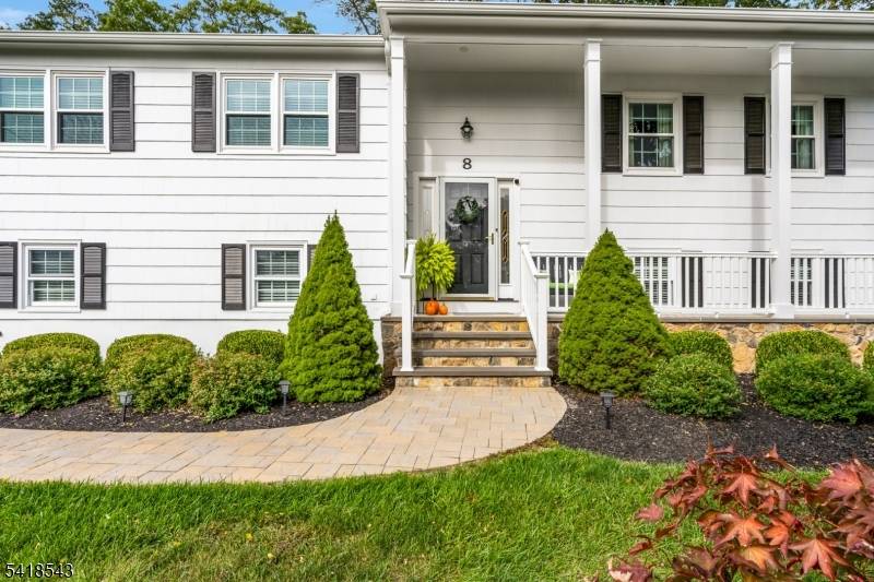 From the moment you arrive, the inviting curb appeal of this beautifully maintained 4 bedroom, 2.