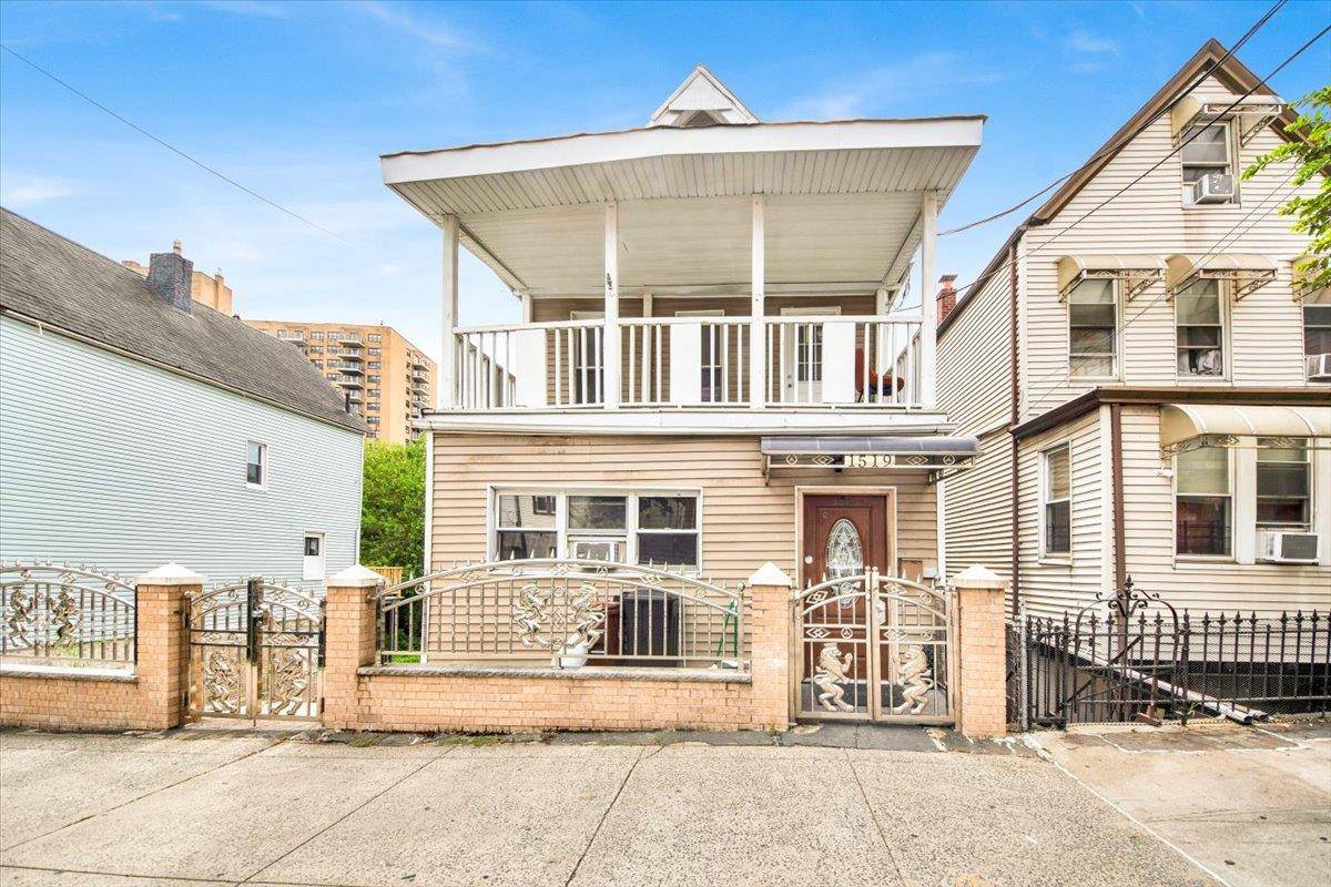 Three family home on a 25x117 R5 zoned lot.