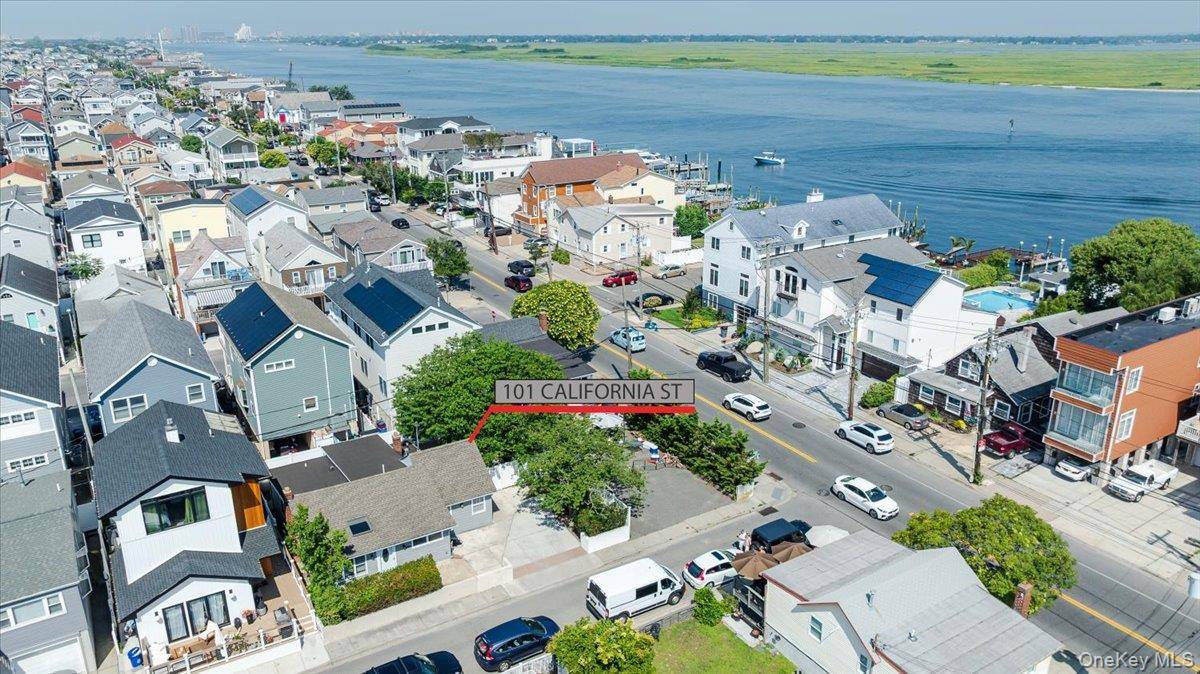 Welcome to this OVERSIZED ranch perfectly situated on a rare DOUBLE LOT in the highly sought after West End of Long Beach.