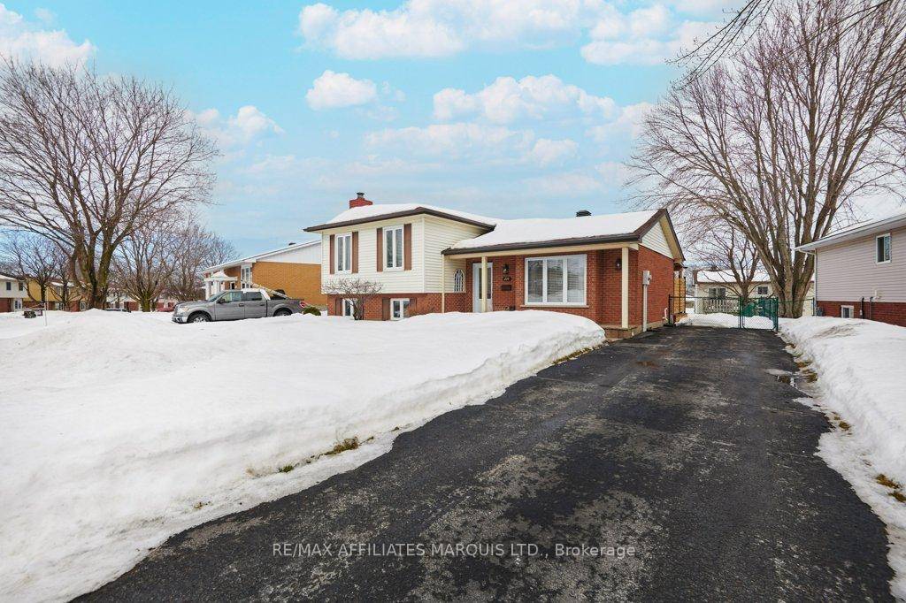 Welcome to this delightful and charming 3 bedroom side split home, perfectly designed for both comfort and privacy.