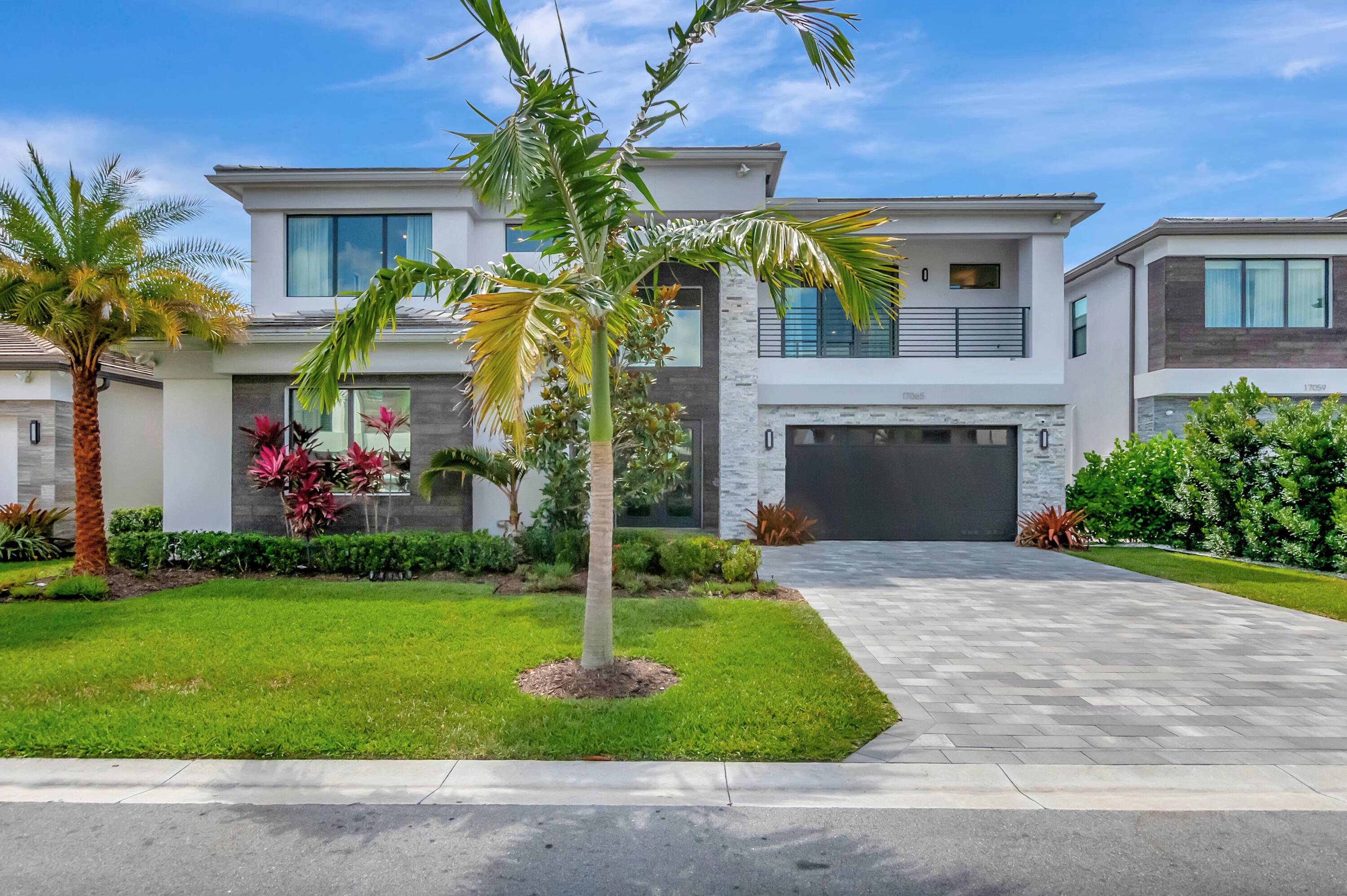 Discover unparalleled luxury in this fully upgraded, move in ready Sumatra model located in the exclusive LOTUS community of Boca Raton.