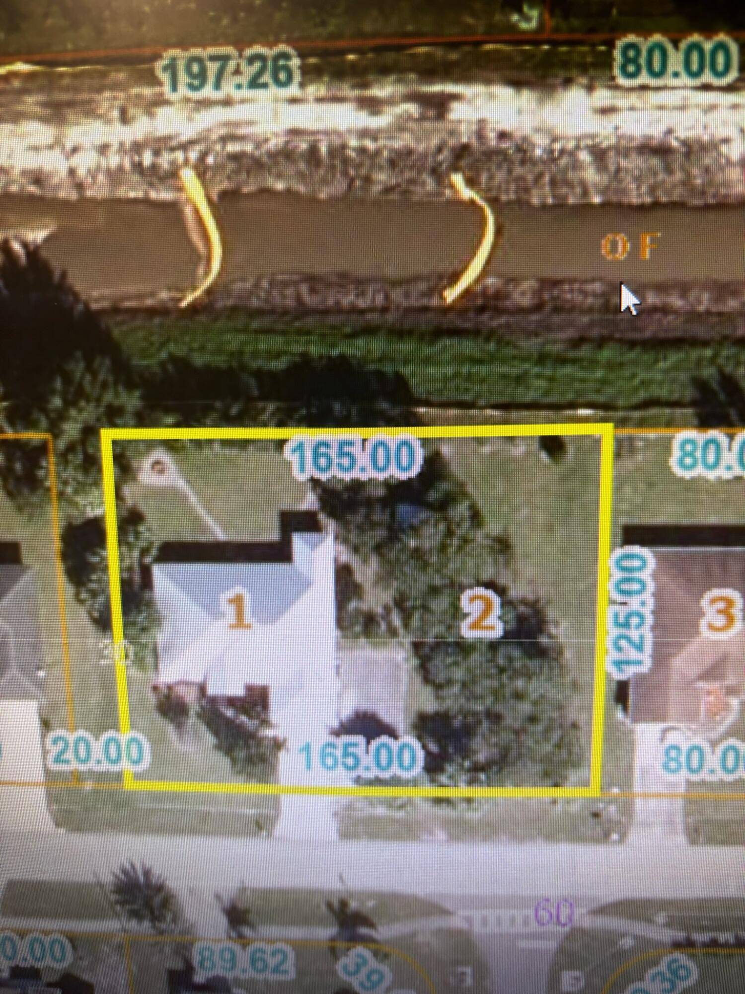 Build your dream home on this nice high and dry lot on canal with Avocado trees, peach trees.