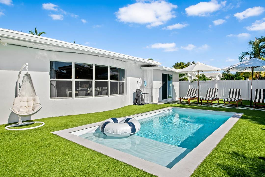 This beautiful home has the best that South Florida living has to offer.