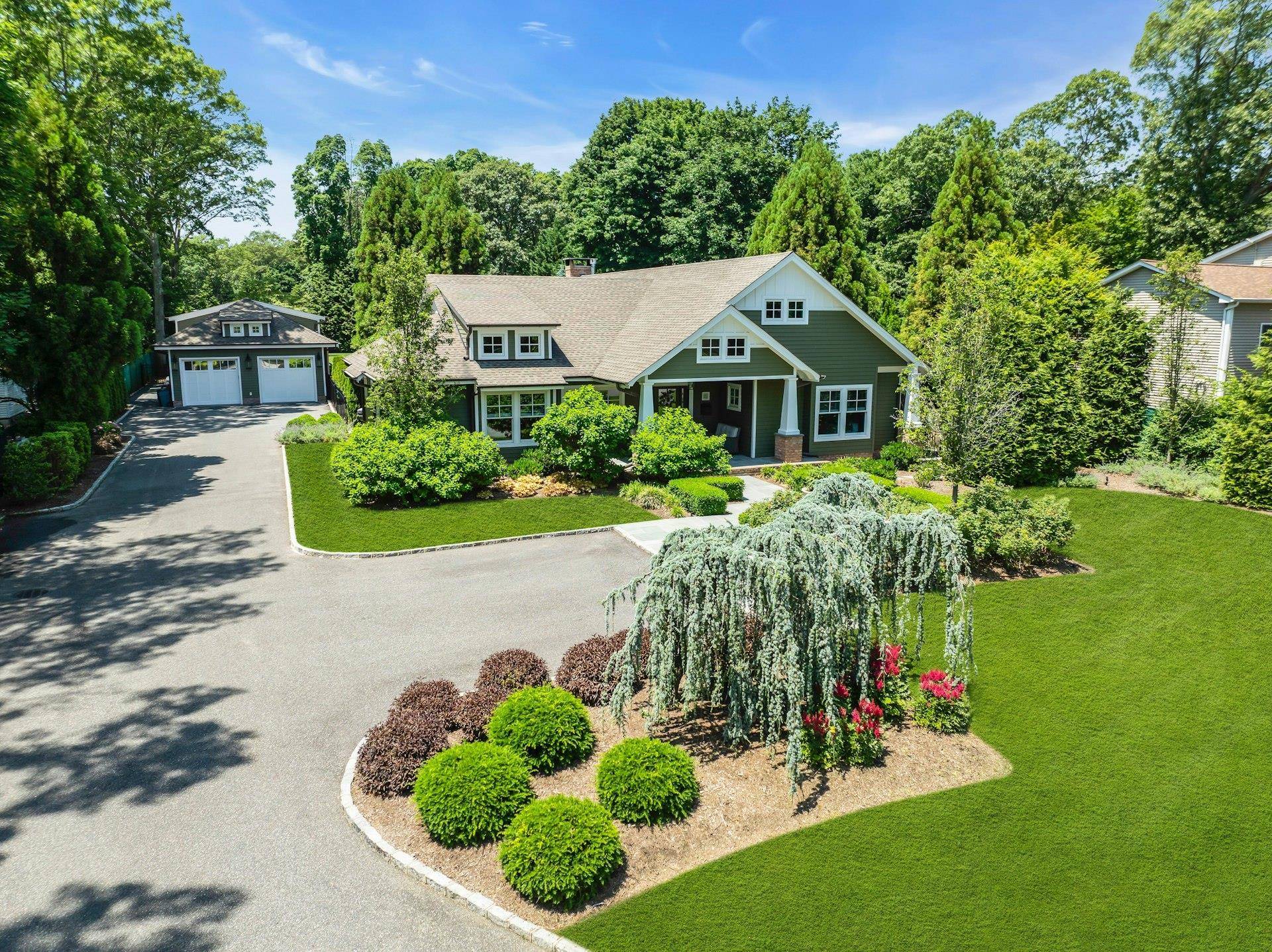 Welcome to a unique compound, this stunning Craftsman home showcases an airy open concept layout with soaring ceilings and elegant rift and quartered oak flooring thoughout, known for its beauty ...
