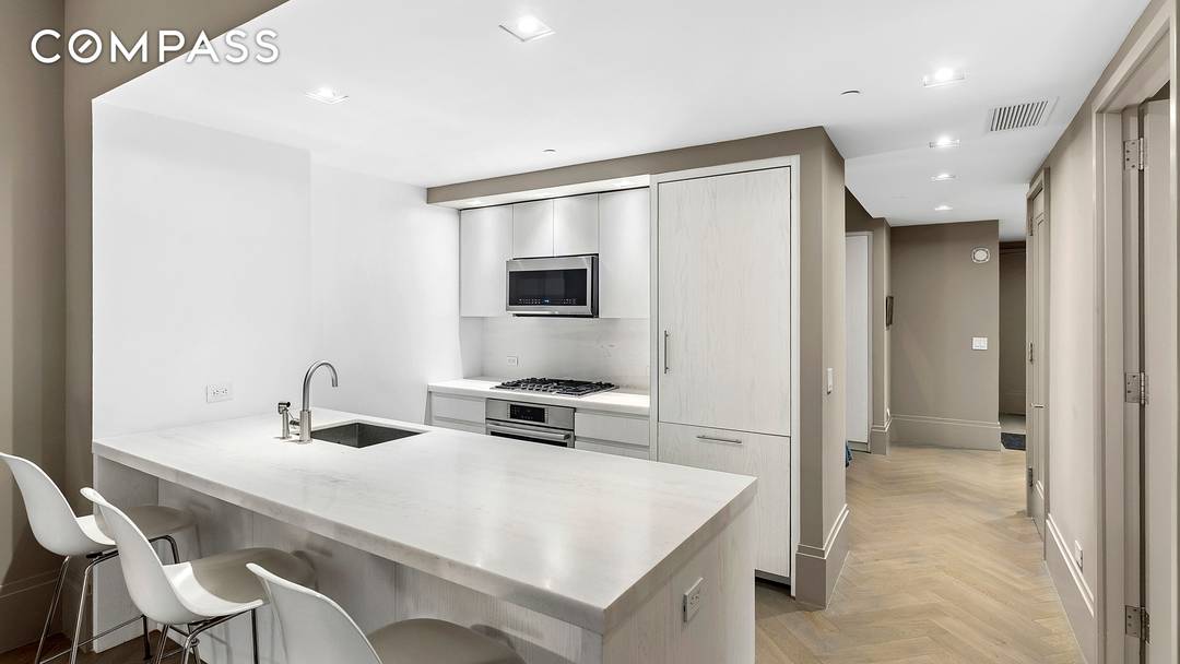 Welcome to Residence 7C at 101 Wall Street a home that offers a new development feel without the new development pricing.