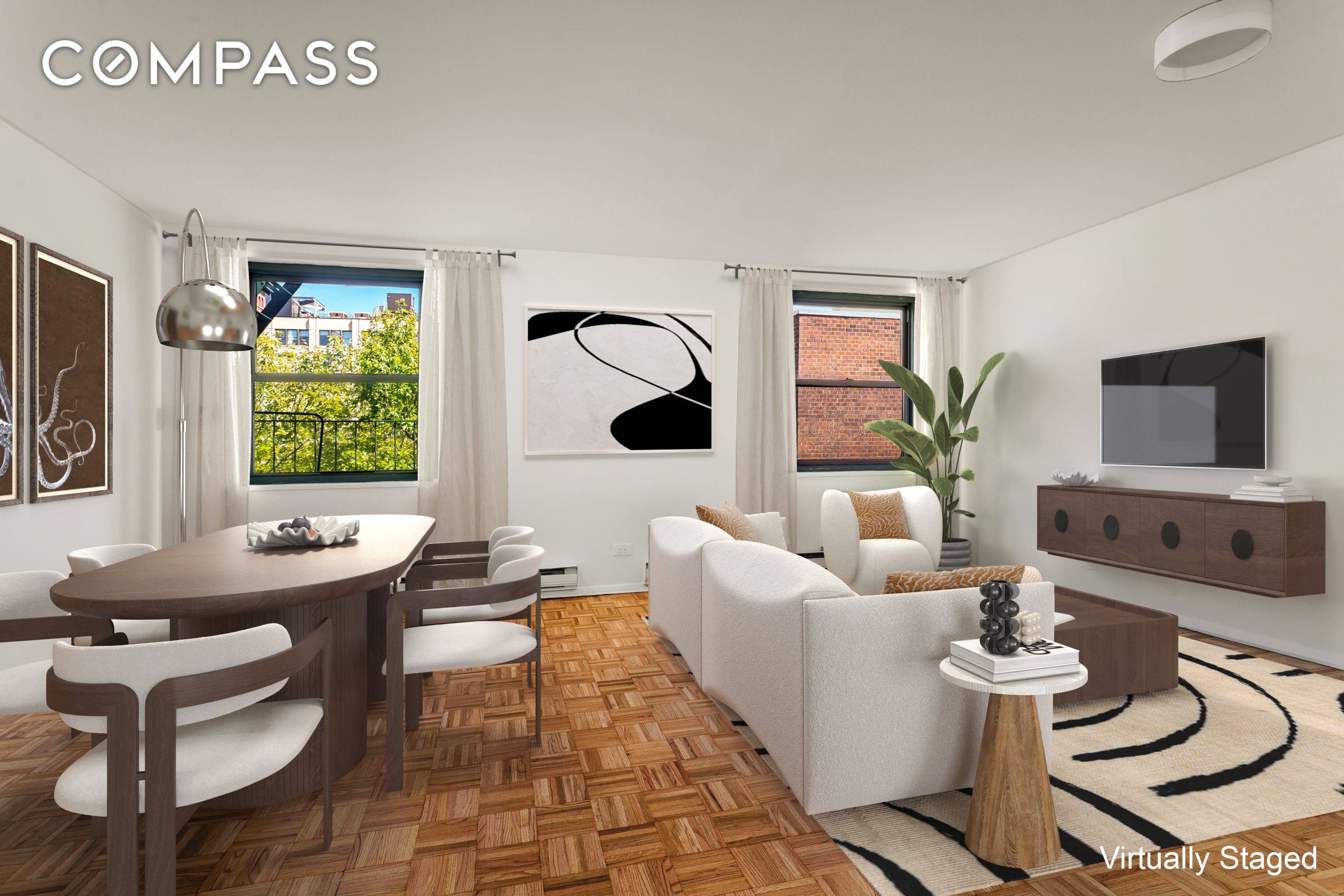 Enjoy golden sunsets over the Hudson River in this light filled floor through home directly across from the Hudson River Park.