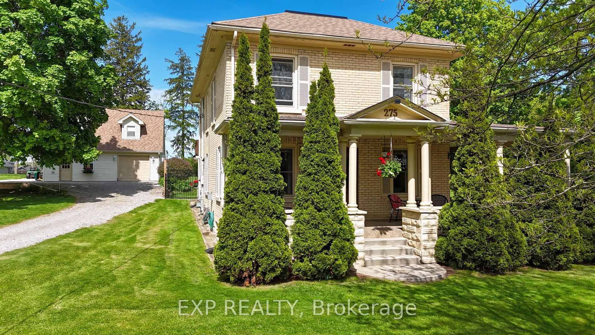 Charming Yellow Brick Century Home on an Oversized City Lot !