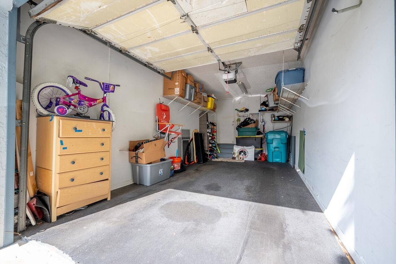 This rare 3 bed 2 bath DIRECT LAKE VIEW, VAULTED CEILINGS with GARAGE, END UNIT has extra windows light.