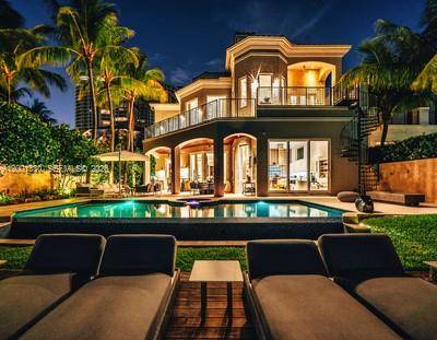 One of South Florida's most extraordinary waterfront estates, set on an exclusive private island within the 24 7 gated enclave of Island Estates, Aventura.