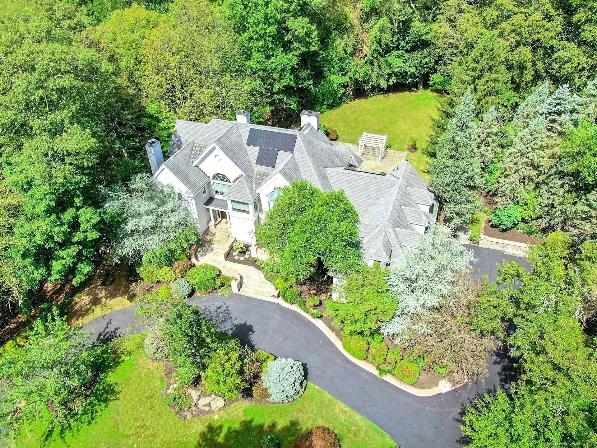 Welcome to 39 Running Brook Lane, an exceptional custom built home set on 2.