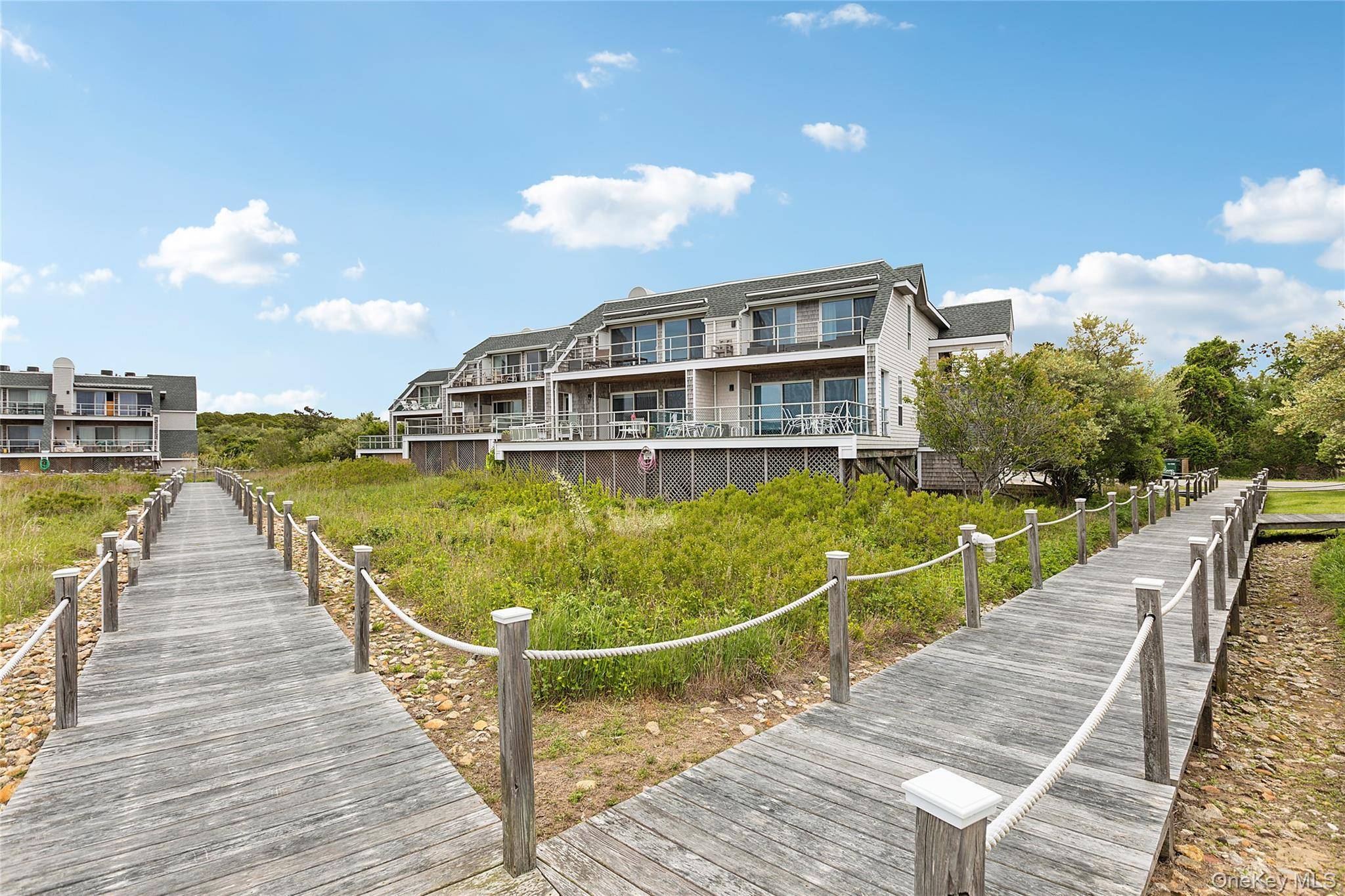 REDUCED TO SELL ! Just listed, renovated and Large two bedroom, two bath condominium situated on Fort Pond Bay with the most beautiful sunsets.