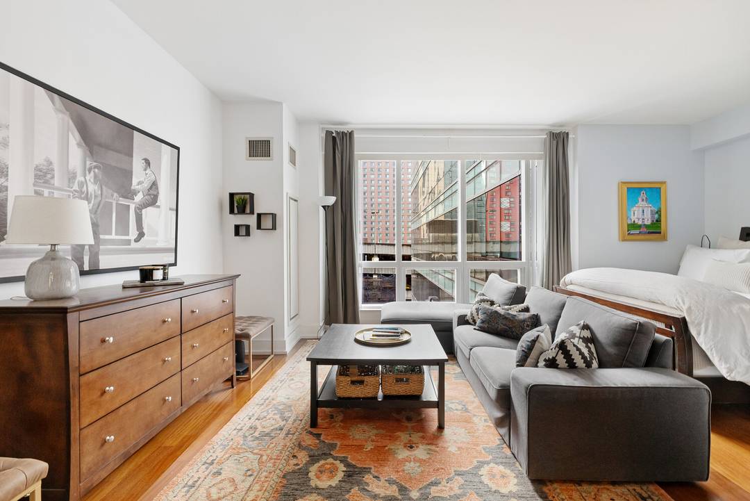 This spacious and sunlit alcove studio offers a perfect blend of city living and comfort, located in the heart of Midtown West.