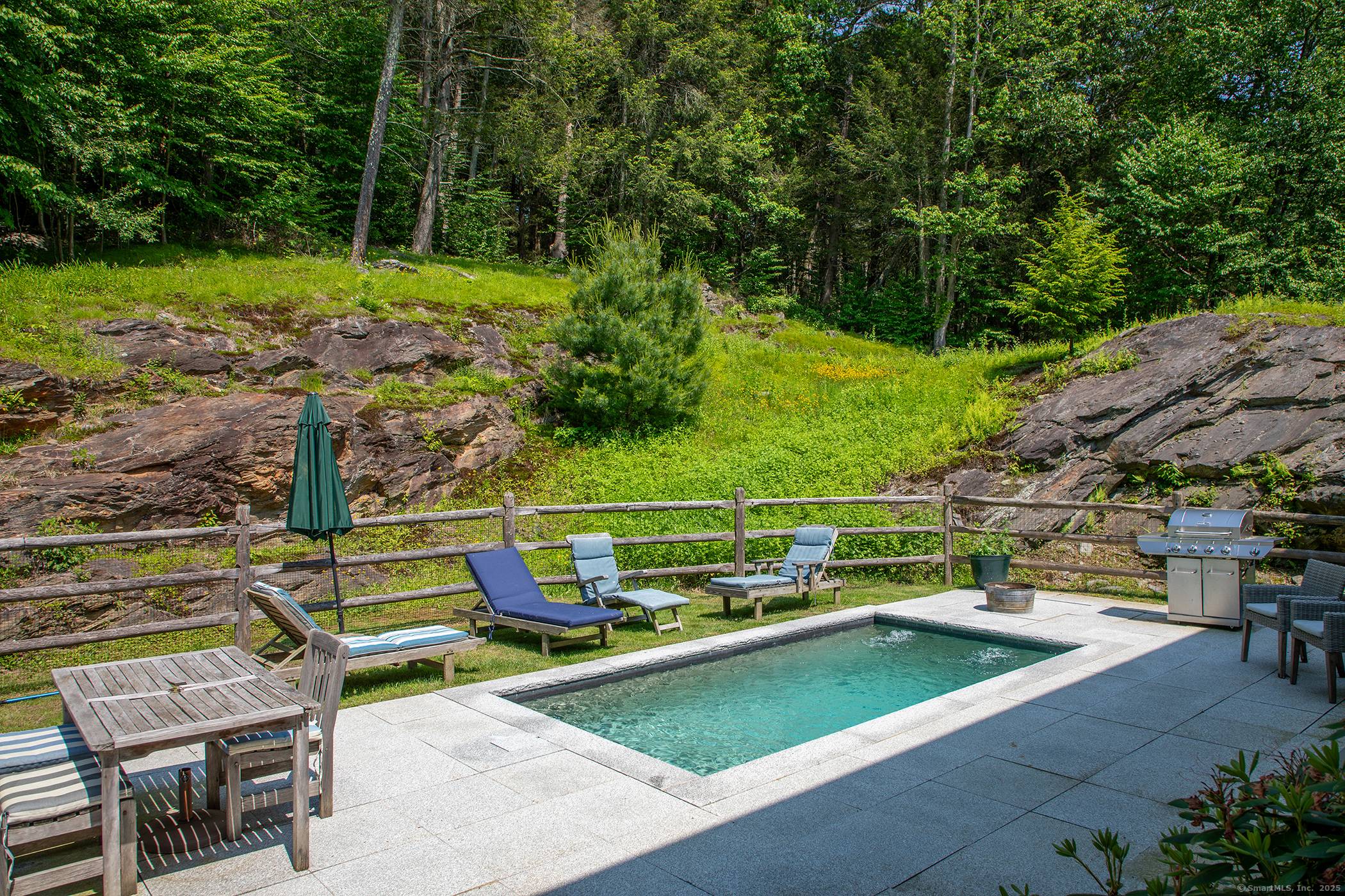 MUST SEE ! New Nantucket white cedar shingle siding, window trim, new interior doors and hardware and heated, year round pool all on the best rural Roxbury scenic dirt road ...