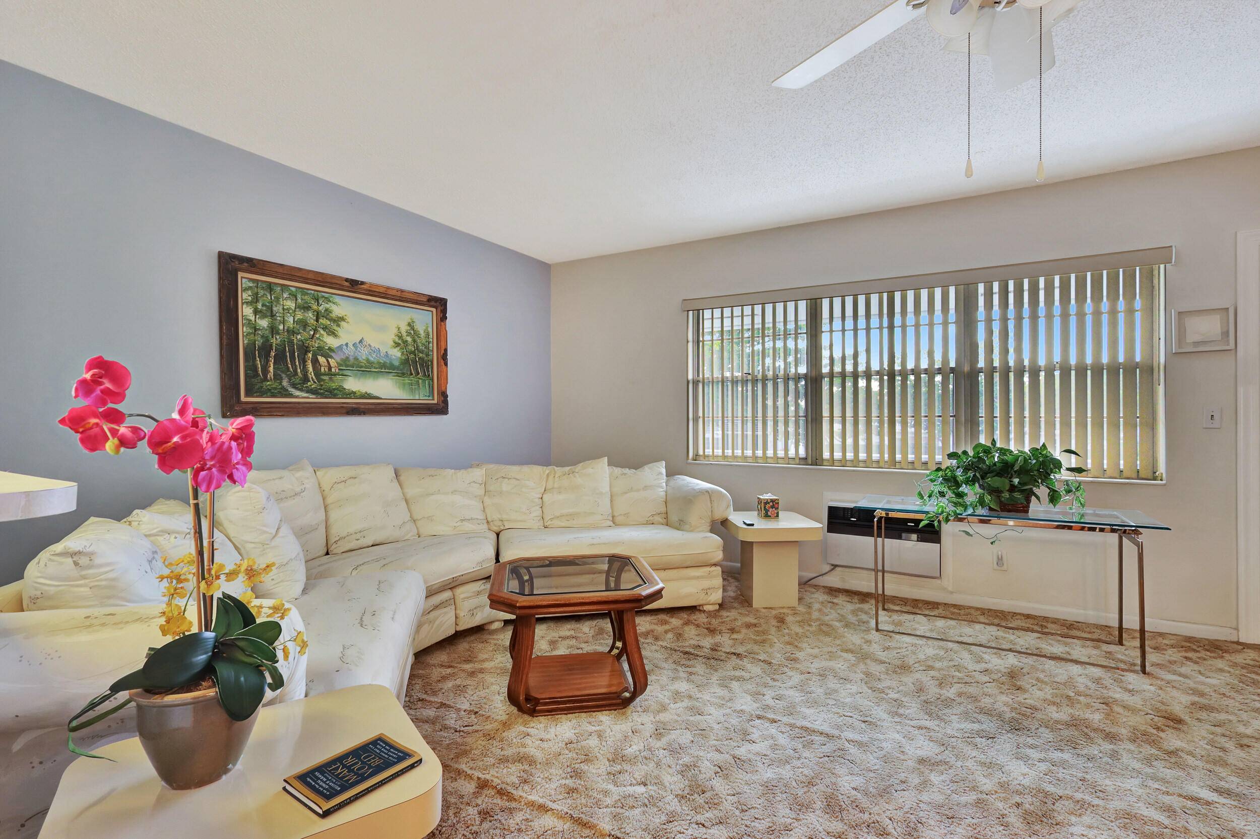 Immaculate 2nd story unit located in the, 55 age gated community of Century Village.