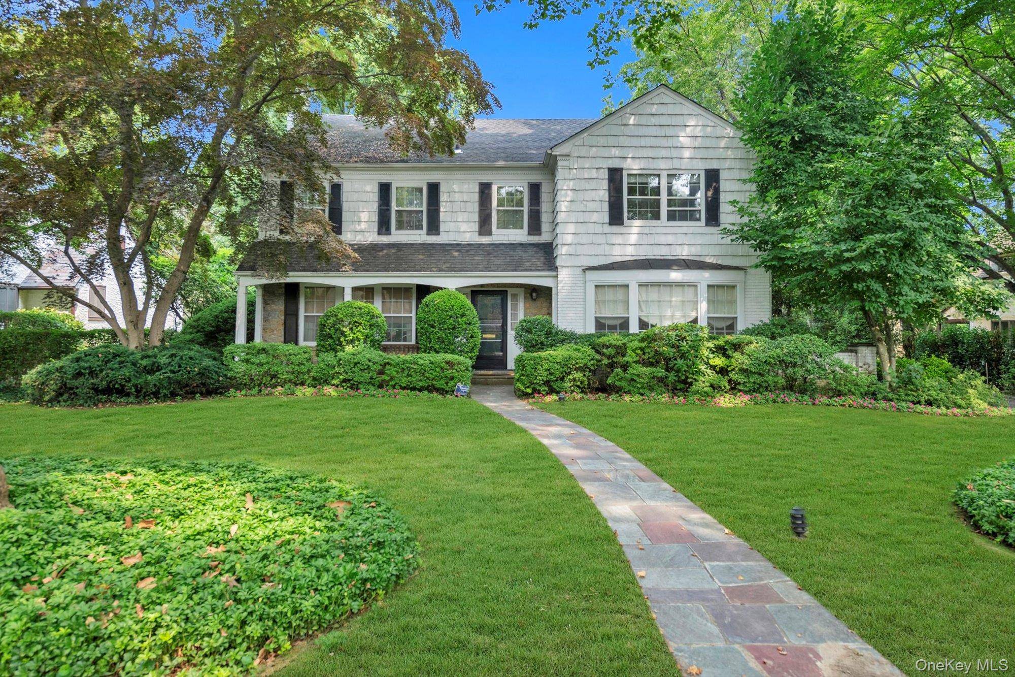 This stunning custom built house offers luxurious living in the prestigious Village of Russell Gardens which provides easy access to shopping, transportation, and access to Great Neck South Schools.