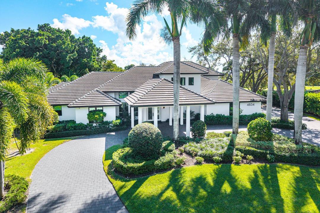 Welcome to an exceptional totally renovated 2021 Estate offering a refined living space in the prestigious Delray Dunes Golf Country Club.