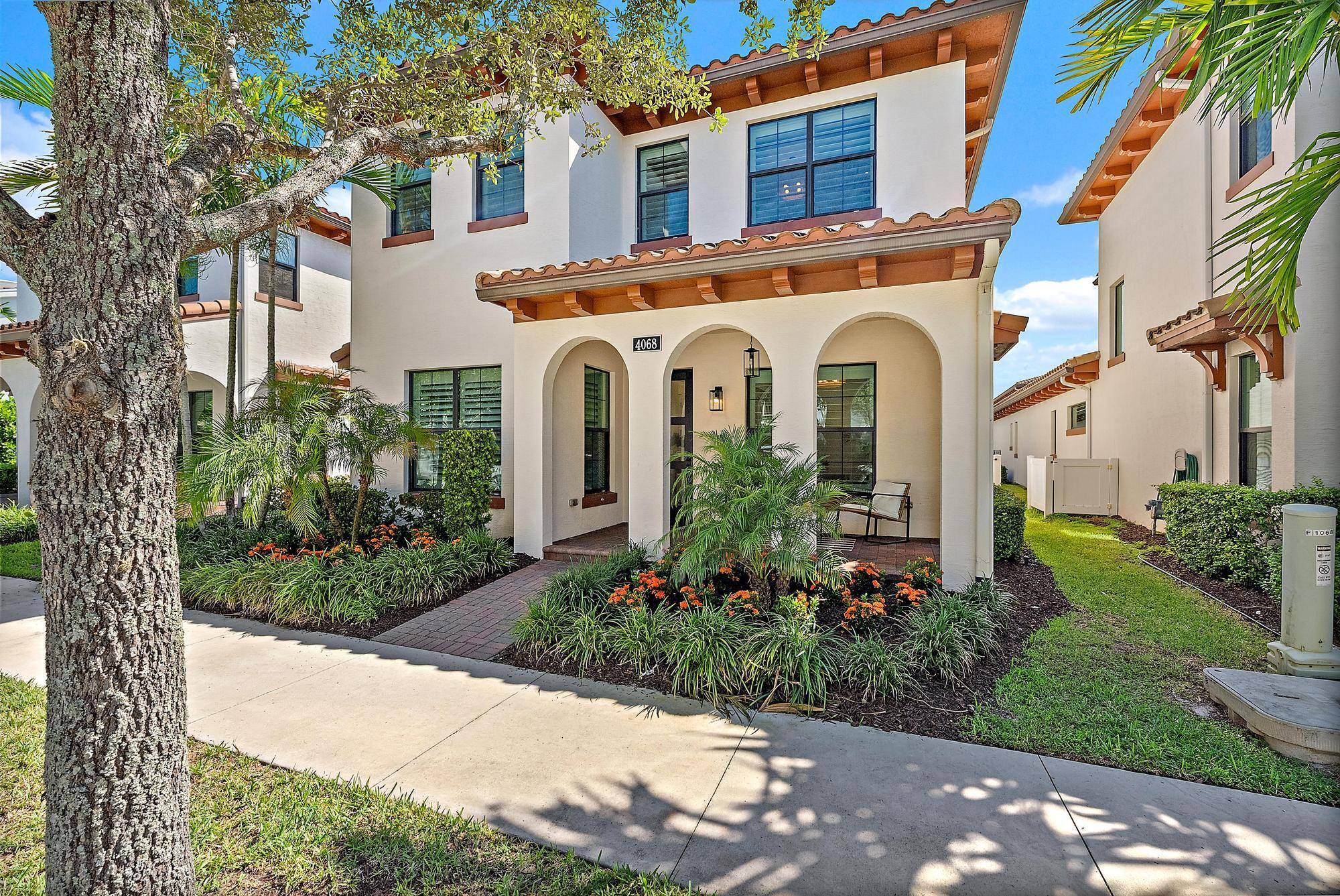 Step into modern elegance with this stunning Exeter model in the highly sought after Alton community of Palm Beach Gardens.