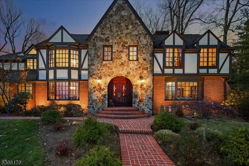 Breathtaking views the moment you arrive at this elegant, meticulously maintained home.