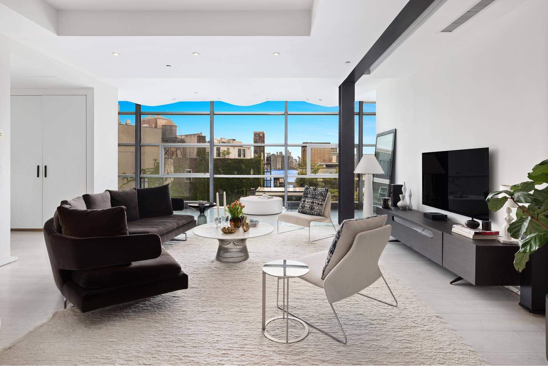 Located at the crossroads of SoHo, Tribeca and the West Village, this exceptional three bedroom, two and one half bathroom home with outdoor terrace offers breathtaking city and water views ...