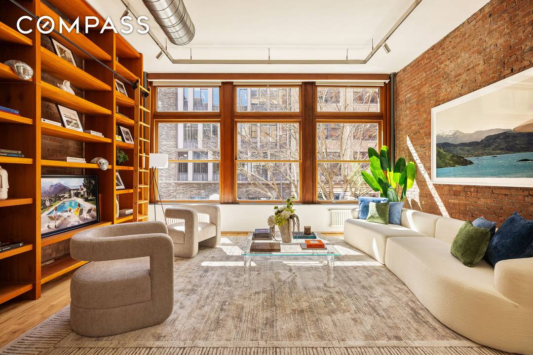 Step out of your key locked elevator directly into a full floor NoHo loft where classic Downtown Manhattan architecture meets a thoughtful 2011 modernist gallery style renovation by ICON Architects.