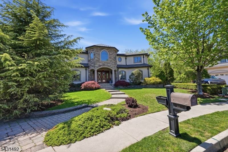 Experience elevated luxury living in this one of a kind Paramus Colonial estate, where timeless elegance meets resort style comfort.