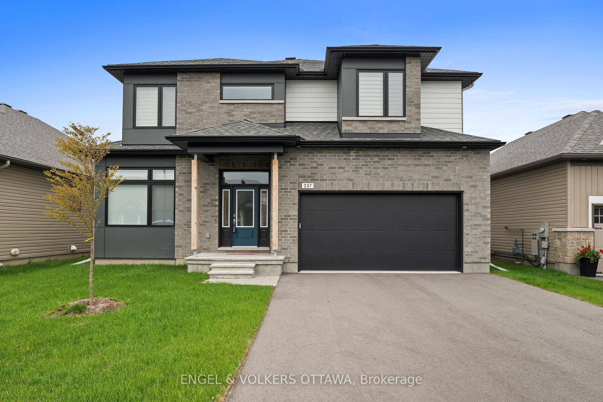 Welcome to this stunning executive 6 bedroom, 5 bathroom home in the prestigious golf course community of Equinelle.