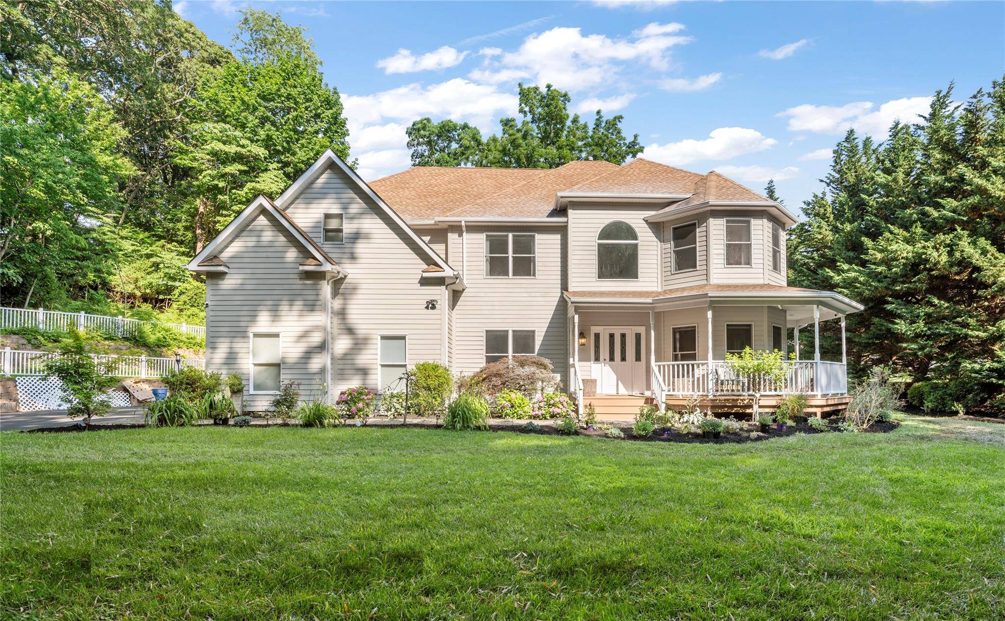 Privacy and elegance define this stunning 5 bedroom, 3 bath home, built in 2001 and nestled on 1.