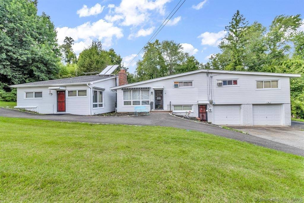 Great Brookfield Contemporary Split Style Home with Legal Accessory 1 Bed Apartment.