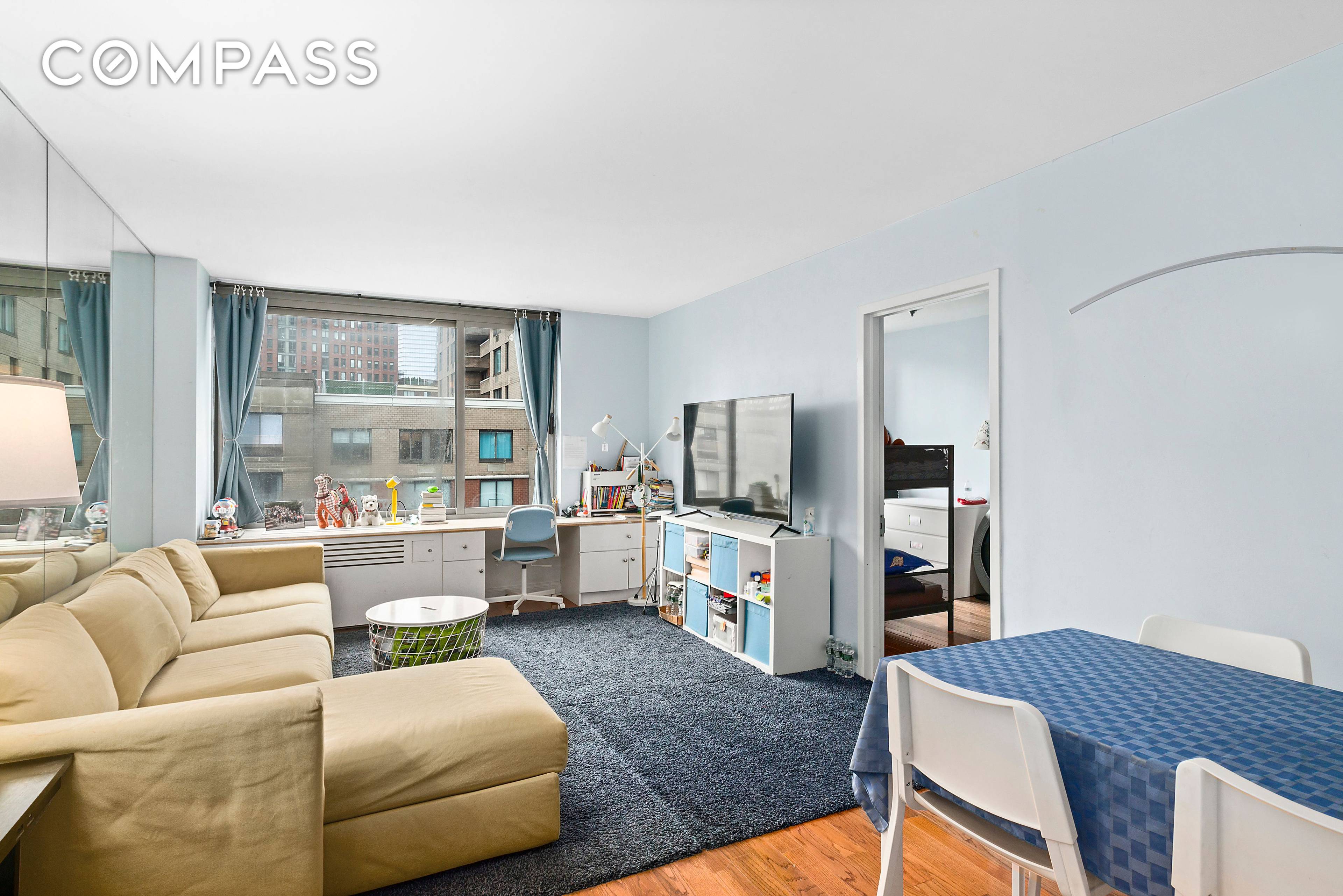 This high floor converted two bedroom home is bright and spacious.