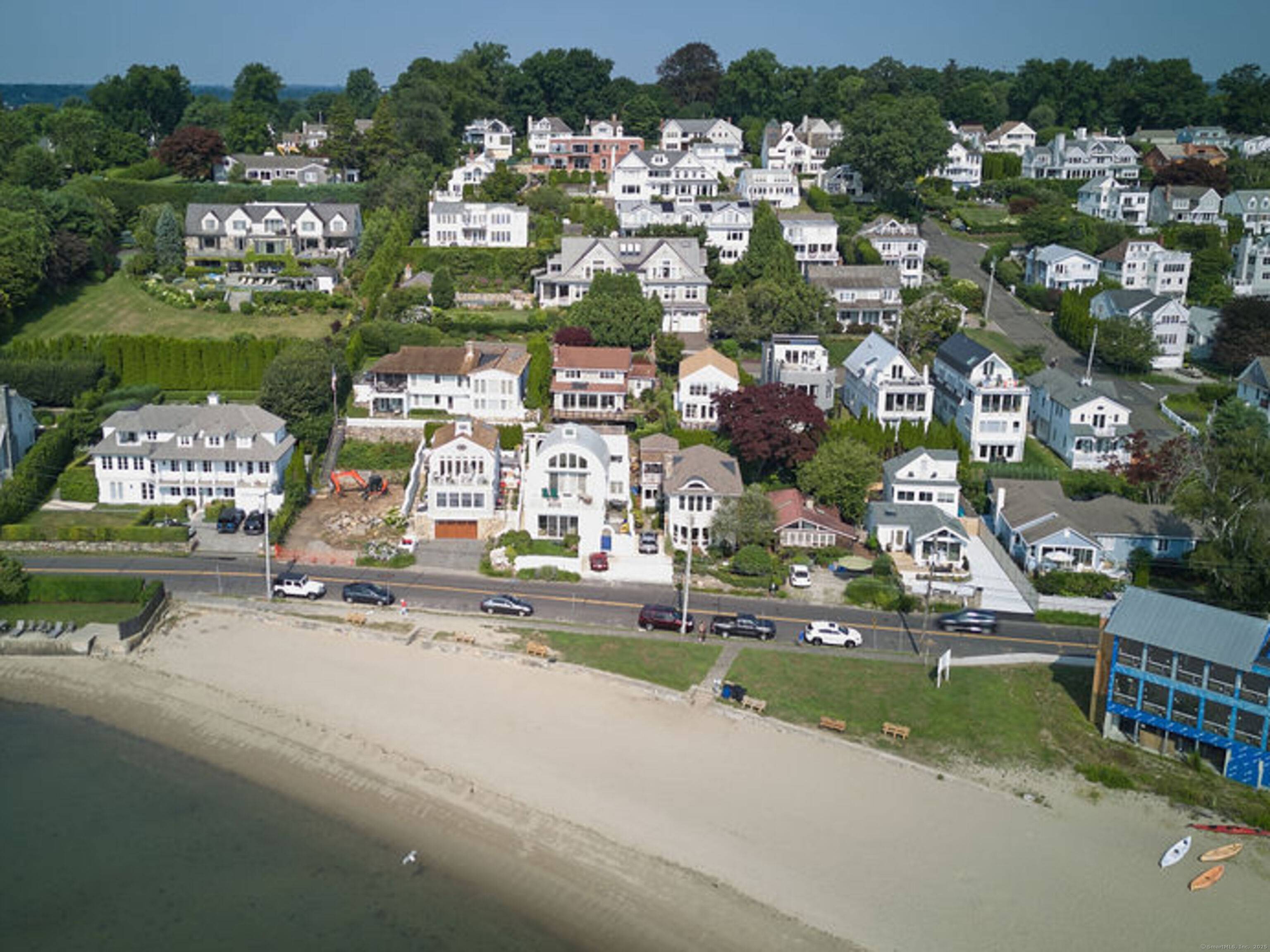 Experience the pinnacle of waterfront living with this unique opportunity to custom design and build your dream beach house on the tranquil shores of Long Island Sound.